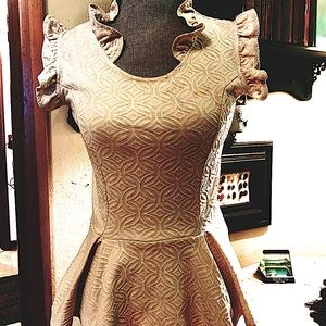 Cream frilly peplum blouse with flattering ruffle detail